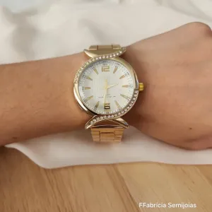 RELÓGIO DOURADO DETALHES PEDRAS ONDAS