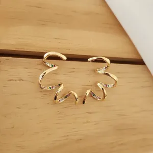 BRINCO ESPIRAL CRAVEJADO EM MICROZIRCÔNIAS COLORIDAS