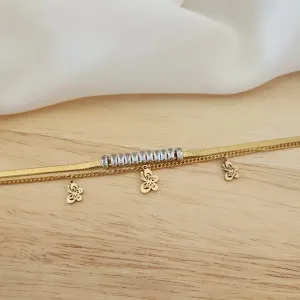 PULSEIRA AÇO DOURADA DOIS FIOS BORBOLETAS E NAVETES