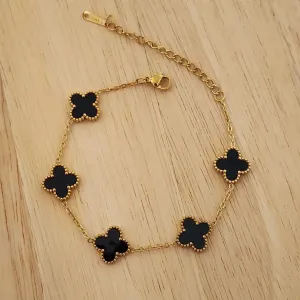 PULSEIRA AÇO DOURADA CINCO TREVOS PRETO G