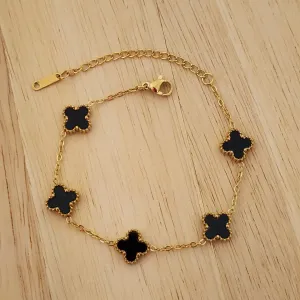 PULSEIRA AÇO DOURADA CINCO TREVOS PRETO M