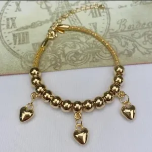 PULSEIRA DOURADA BOLINHA PINGENTE CORAÇÃO