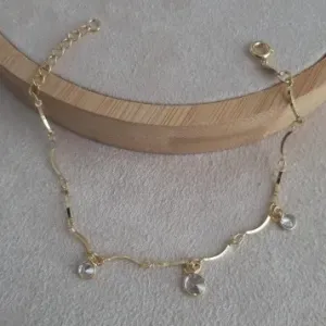 PULSEIRA DOURADA PONTO DE LUZ CRISTAL