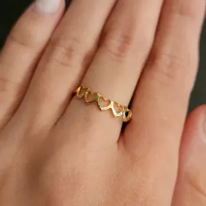 ANEL DOURADO CORAÇÕES VAZADO