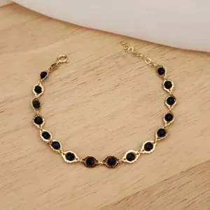 PULSEIRA BOLINHAS PRETAS