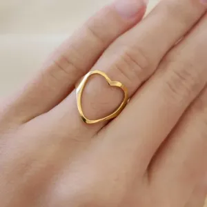 ANEL AÇO DOURADO CORAÇÃO VAZADO