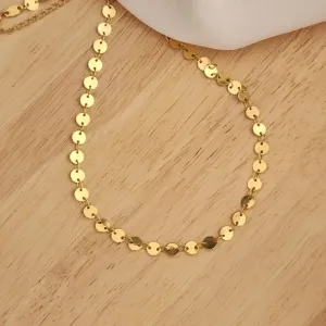 COLAR DOURADO DE CIRCULOS ACHATADOS