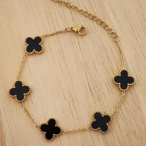 PULSEIRA AÇO DOURADA CINCO TREVOS PRETO G