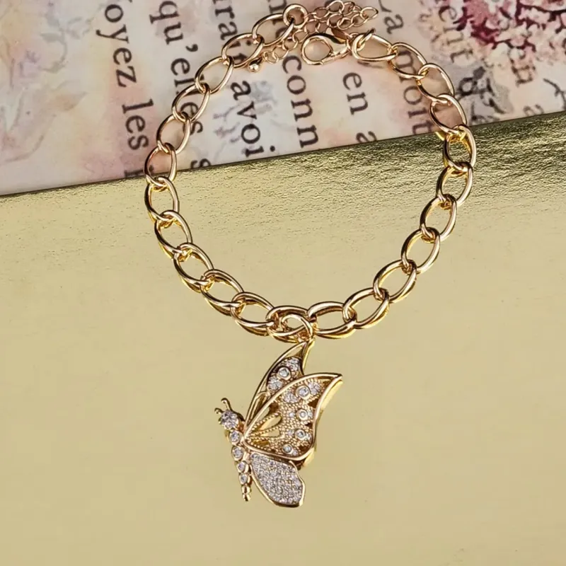 PULSEIRA DURADA ELOS GRANDES PINGENTE BORBOLETA
