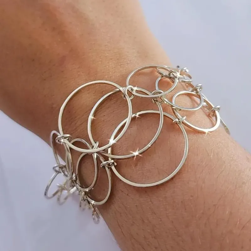 PULSEIRA ELOS CIRCULARES BANHO DE PRATA