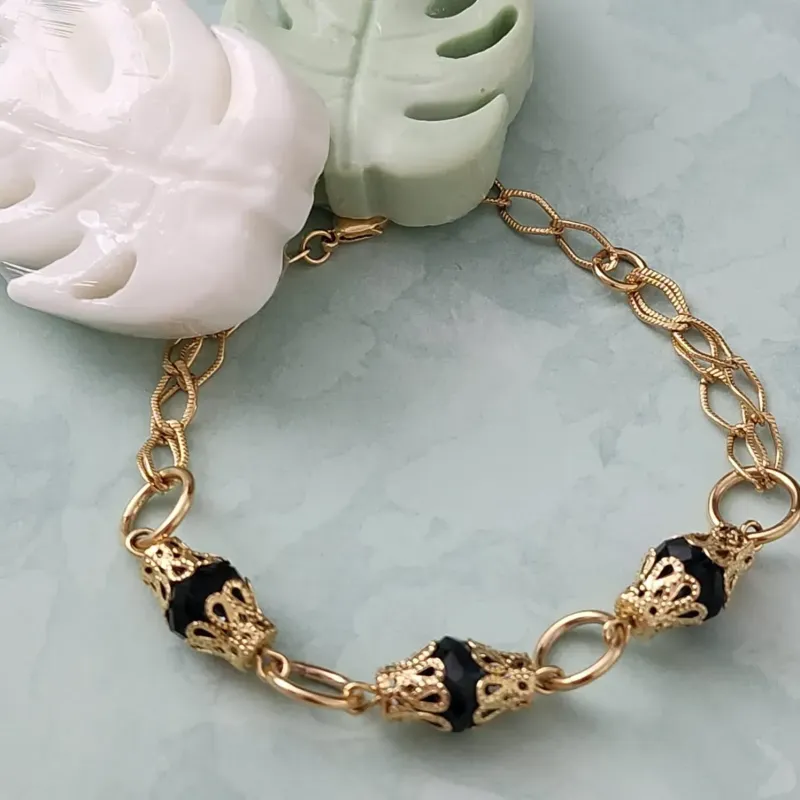 PULSEIRA DOURADA PEDRAS AZUIS