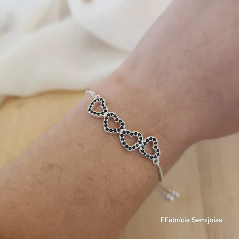 PULSEIRA BANHO DE PRATA CORAÇÃO CRAVEJADO ZIRCÔNIAS NEGRAS