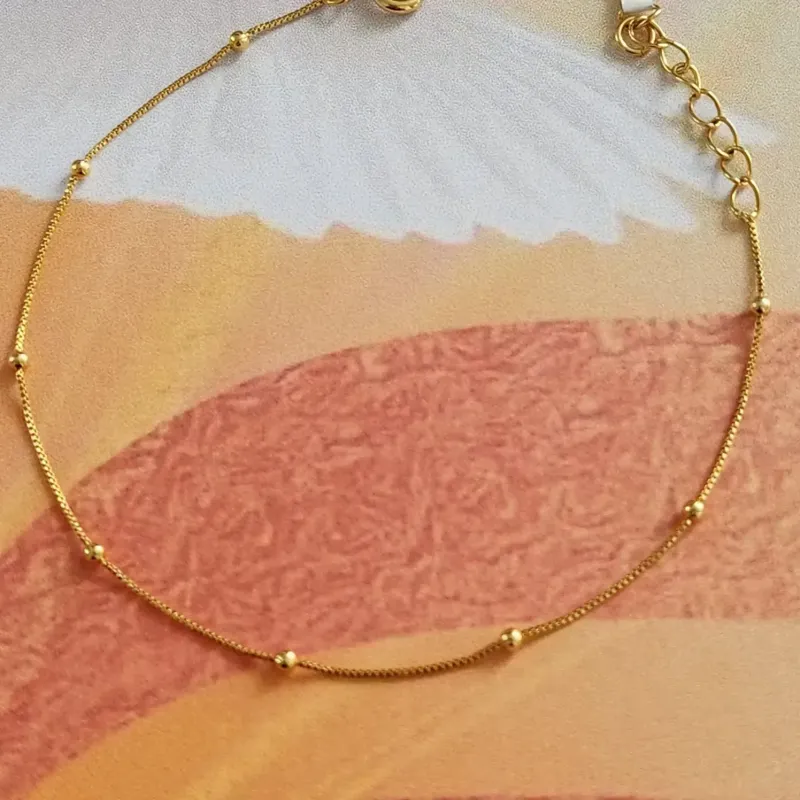 PULSEIRA DOURADA BOLINHA