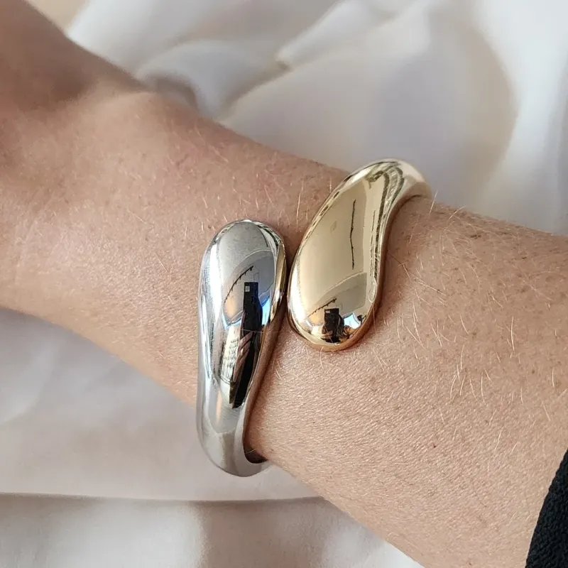 BRACELETE DOURADO E PRATA DUAS GOTAS