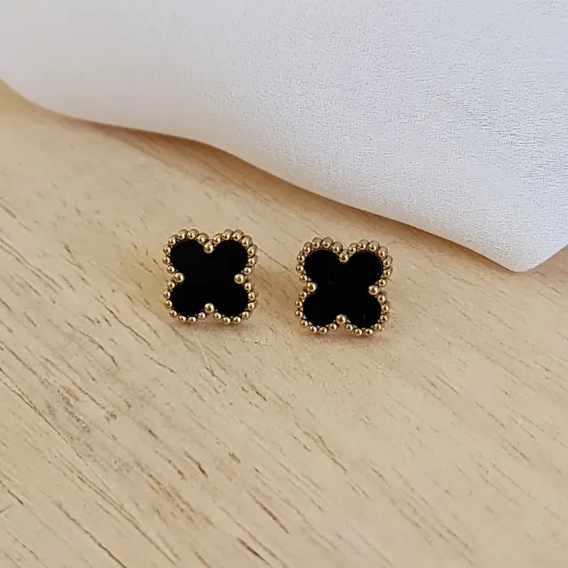 BRINCO AÇO DOURADO TREVO PRETO G