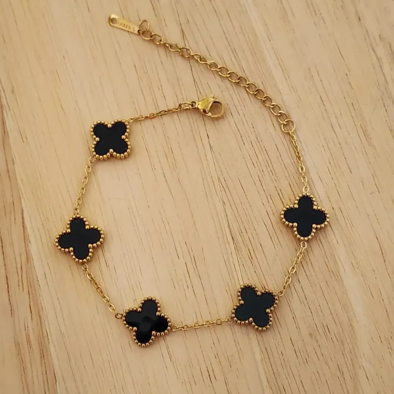 PULSEIRA AÇO DOURADA CINCO TREVOS PRETO G