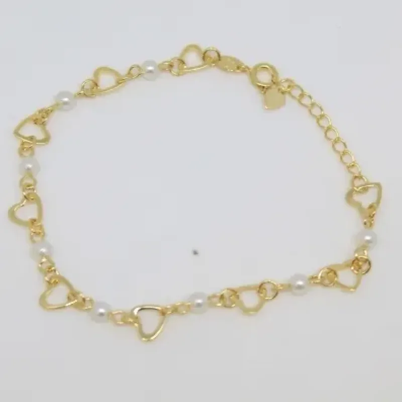 PULSEIRA DOURADA CORAÇÃO VAZADO E PÉROLA