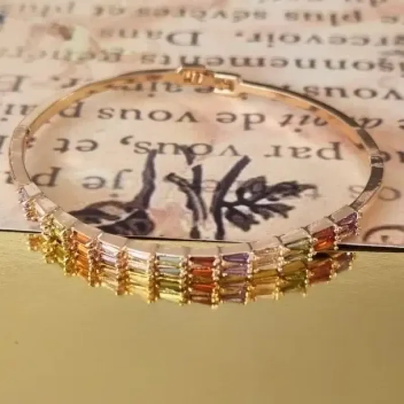 BRACELETE DOURADO NAVETES COLORIDAS