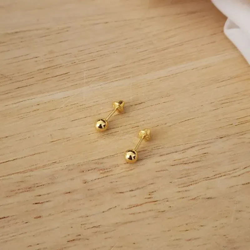 BRINCO DOURADO BOLA BRILHOSA TARRAXA BABY