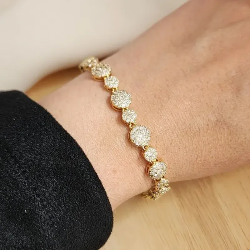 PULSEIRA BRACELETE DOURADA CÍRCULOS CRAVEJADOS EM ZIRCÔNIAS