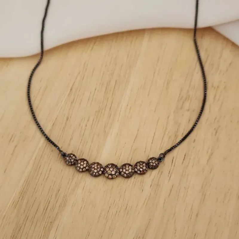 COLAR RÓDIO NEGRO BOLAS CRAVEJADO CITRINO