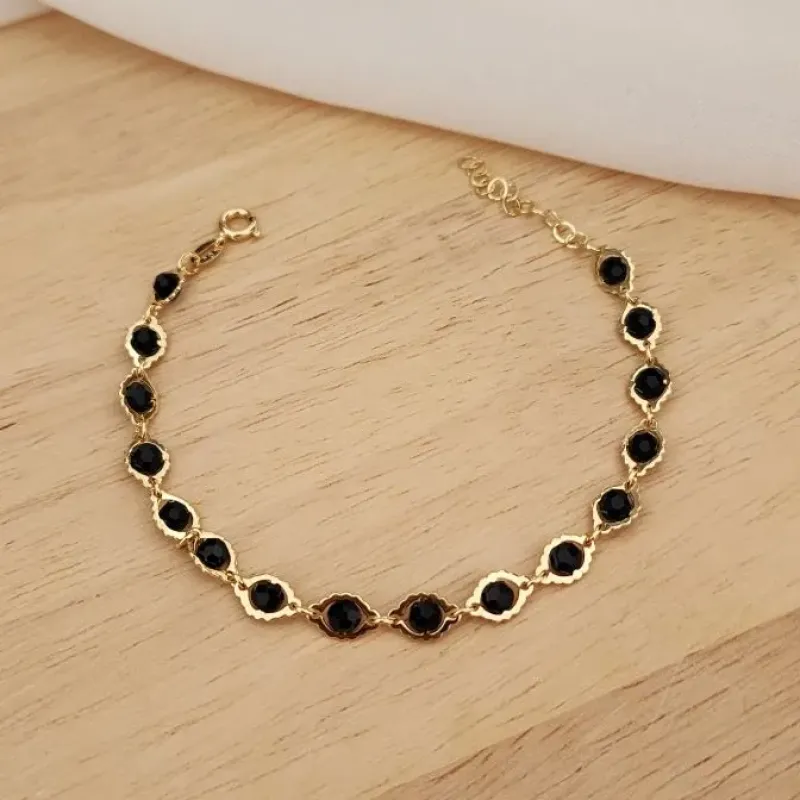 PULSEIRA BOLINHAS PRETAS