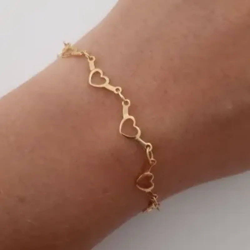 PULSEIRA DOURADA CORAÇÃO VAZADO
