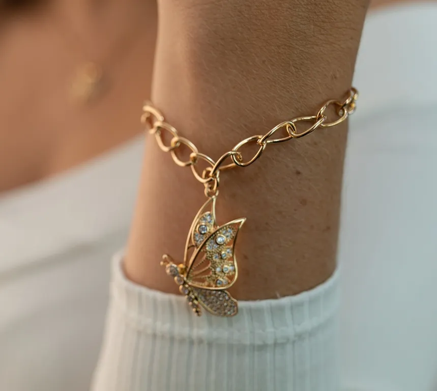 PULSEIRA DURADA ELOS GRANDES PINGENTE BORBOLETA