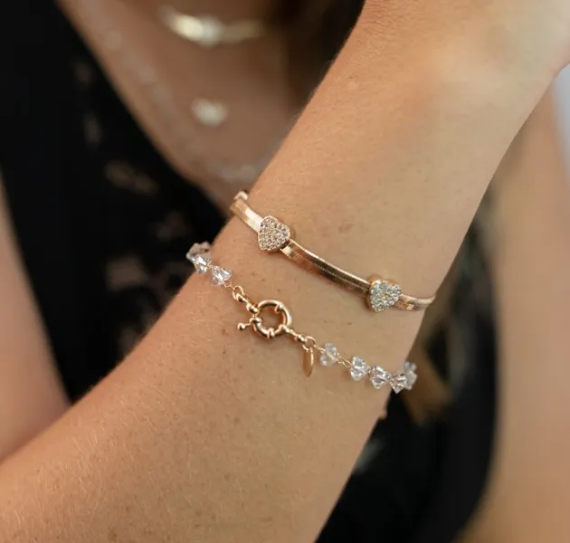 PULSEIRA MALHA DOURADA CORAÇÕES CRAVEJADOS EM MICROZIRCÔNIAS CRISTAL