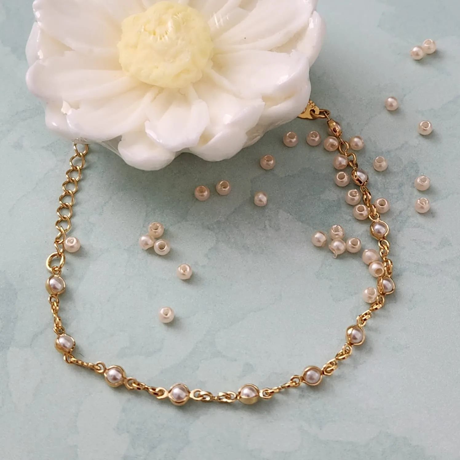 PULSEIRA DOURADA PÉROLA INFANTIL