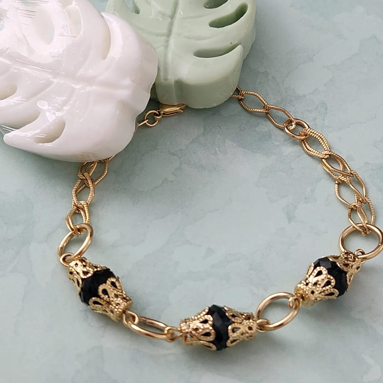 PULSEIRA DOURADA PEDRAS AZUIS