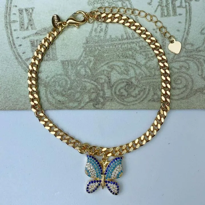 PULSEIRA DOURADA PINGENTE BORBOLETA MICROZIRCÔNIAS AZUIS