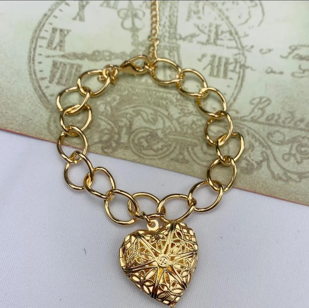 PULSEIRA DOURADA RELICÁRIO CORAÇÃO VAZADO