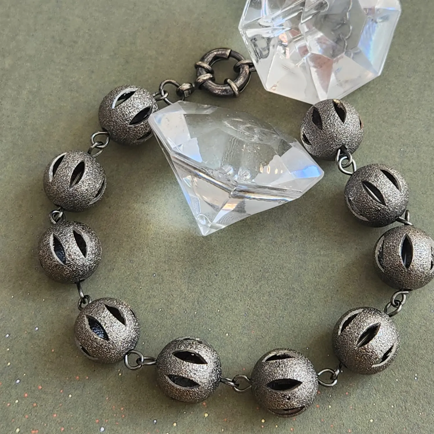 PULSEIRA RÓDIO NEGRO FOSCA BOLAS VAZADAS FECHO BÓIA