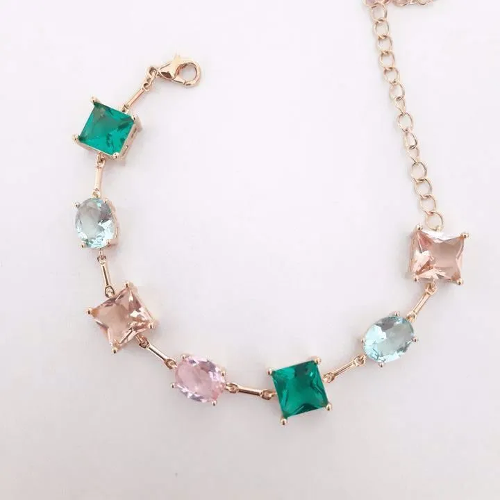 PULSEIRA DOURADA PEDRAS OVAIS E QUADRADRAS ZIRCÔNIAS MULTICOLORIDAS