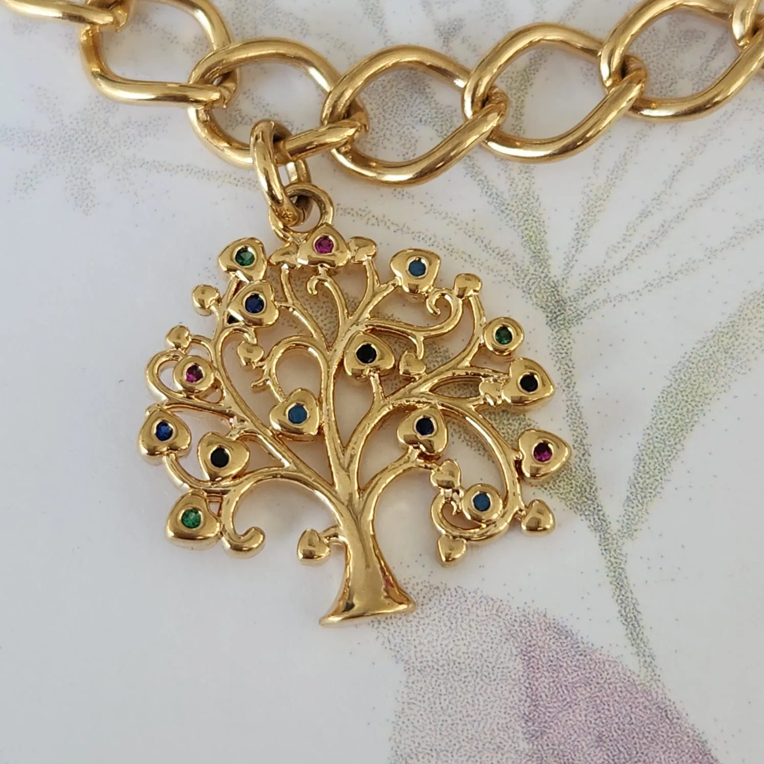 PULSEIRA DOURADA ÁRVORE DA VIDA COM MICROZIRCÔNIAS COLORIDAS