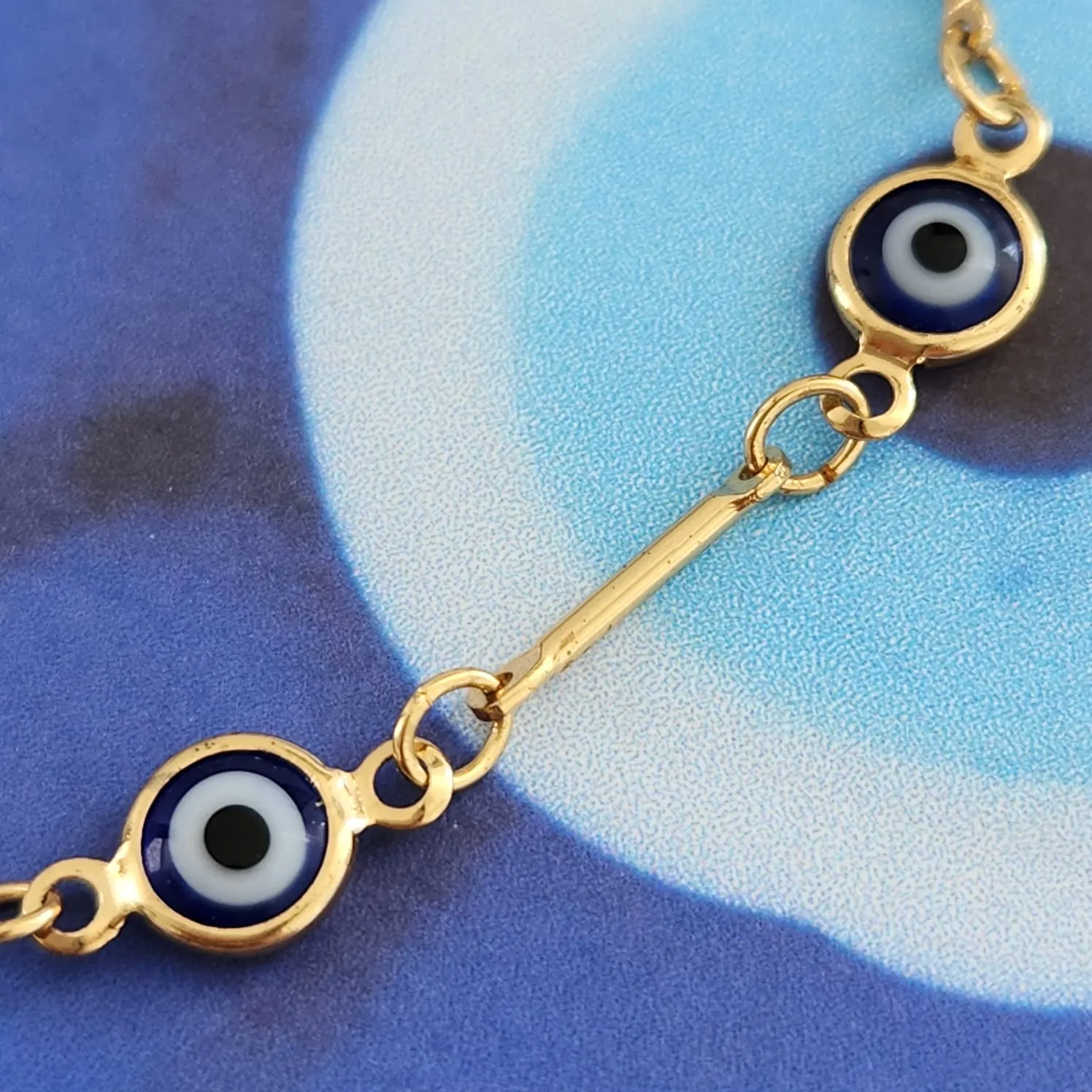 PULSEIRA DOURADA PEÇAS E OLHO GREGO