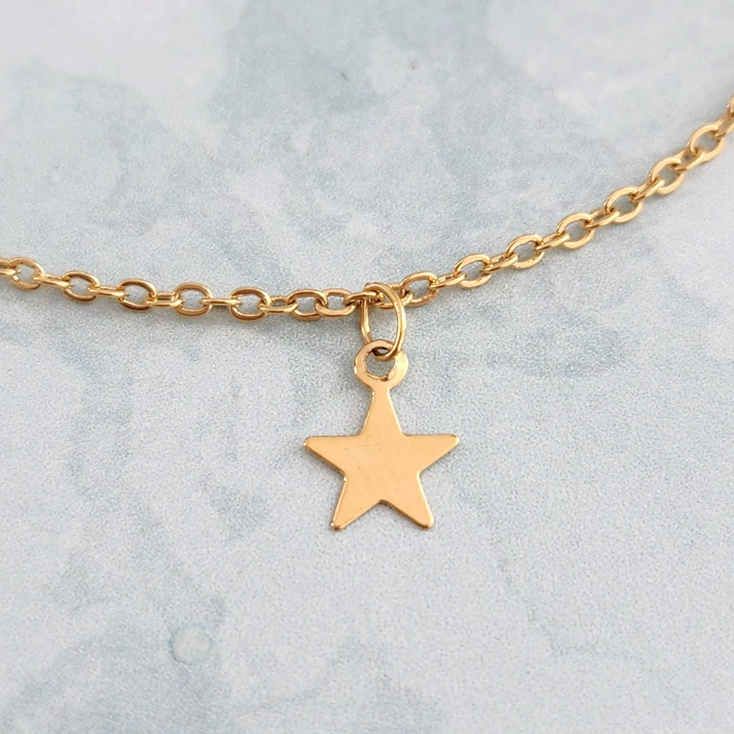 PULSEIRA PINGENTES ESTRELA 18CM