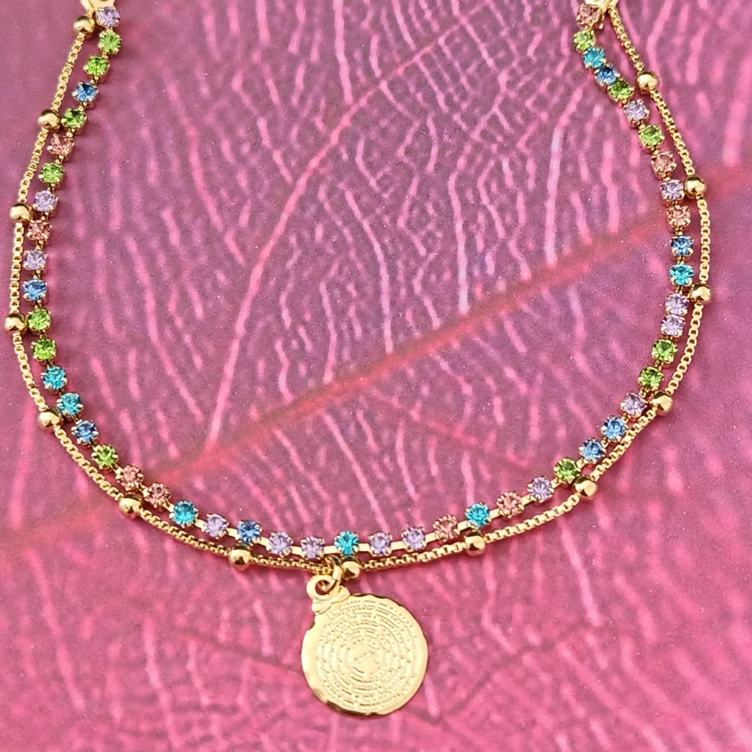 PULSEIRA DOIS FIOS RIVIERA COM BOLINHAS E PINGENTE PAI NOSSO