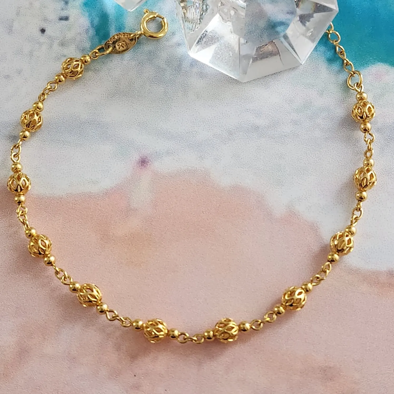 PULSEIRA DOURADA BOLINHA TRABALHADA