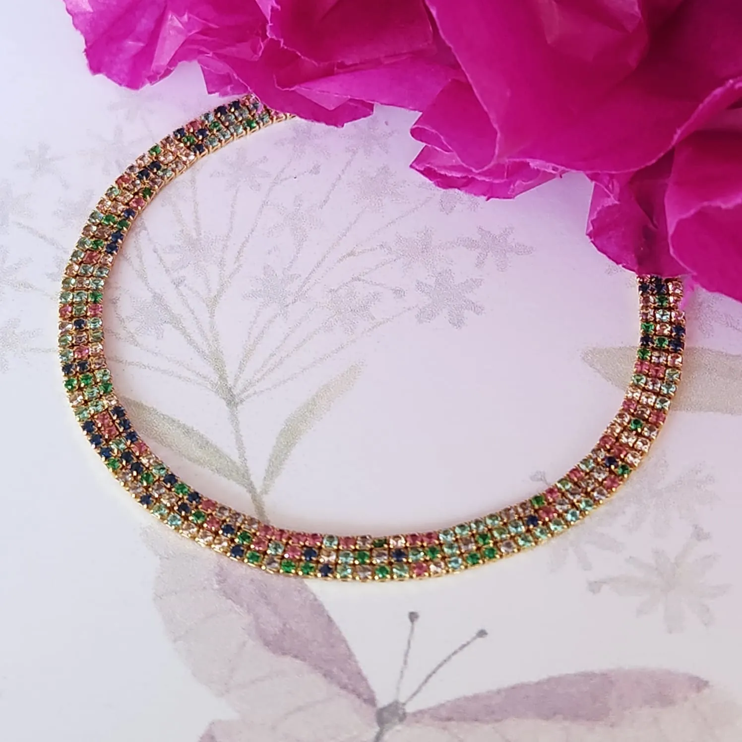 PULSEIRA DOURADA CRAVEJADA EM MICROZIRCÔNIAS MULTICOR