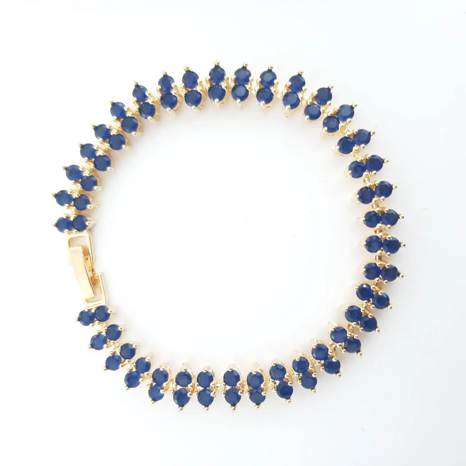 PULSEIRA DOURADA RIVIERA ZIRCÔNIAS  AZUL SAFIRA