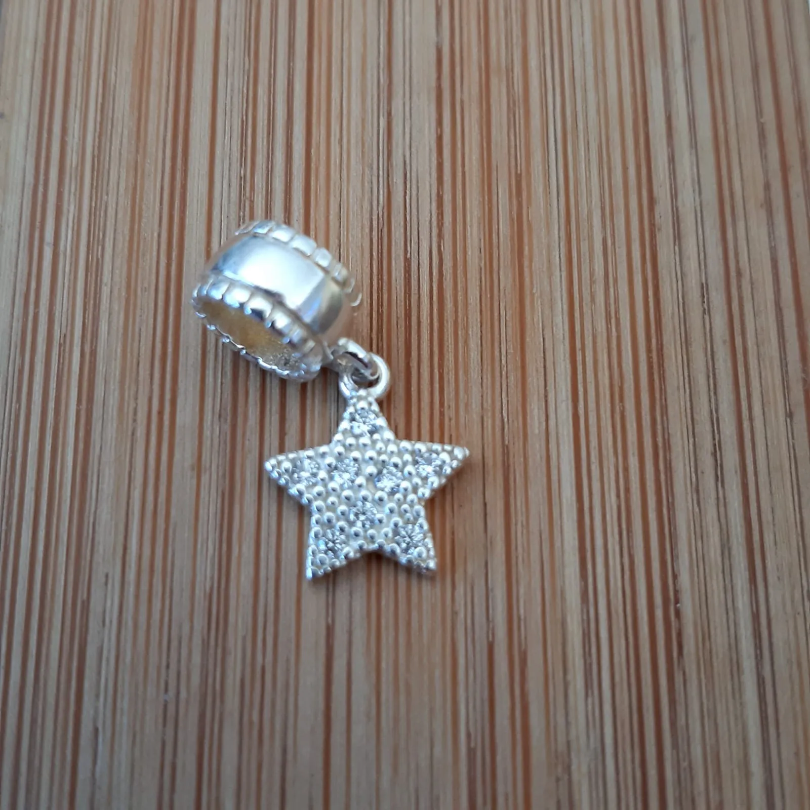 BERLOQUE PRATA 925 ESTRELA CRAVEJADO COM MICROZIRCÔNIAS CRISTAL