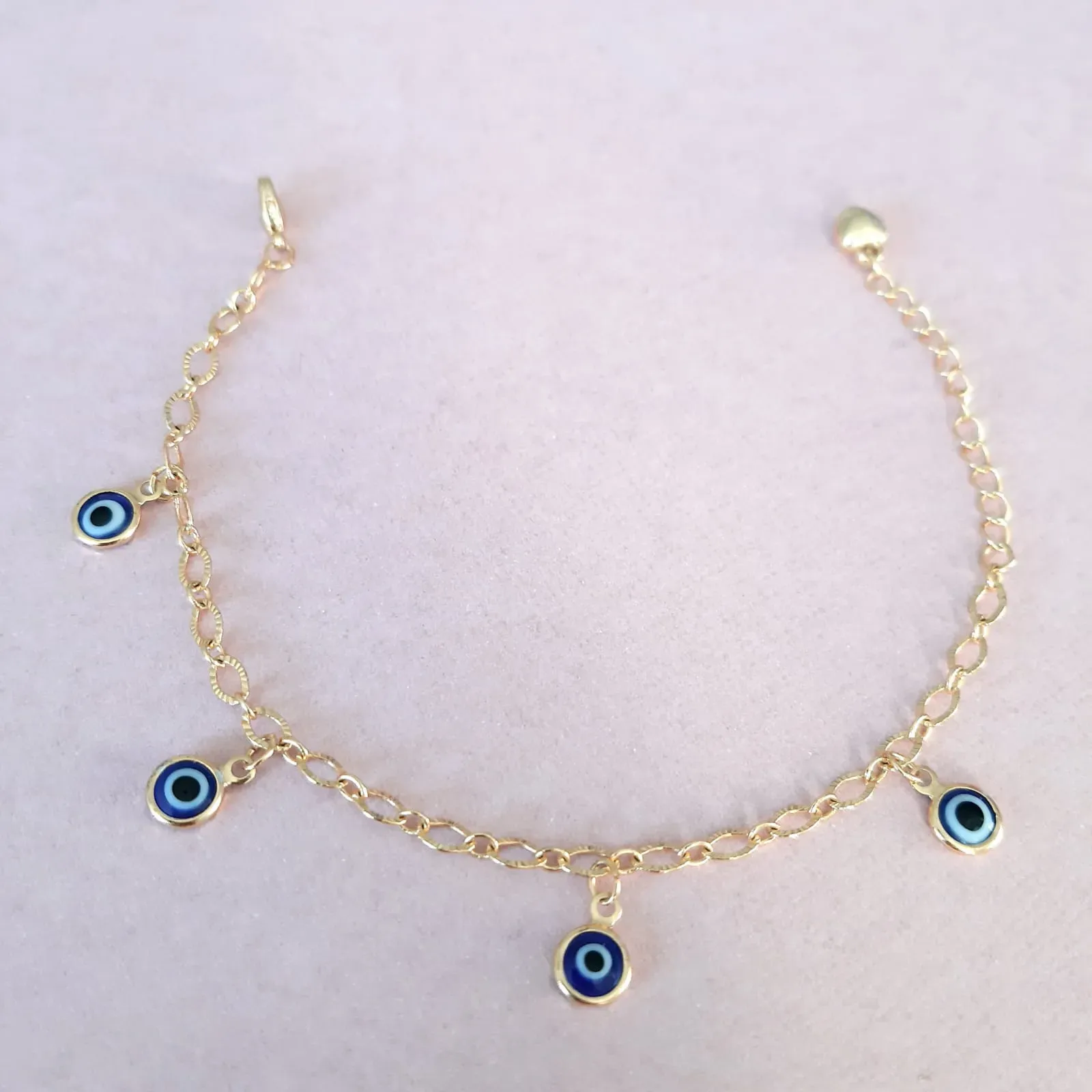PULSEIRA DOURADA PINGENTES OLHO GREGO