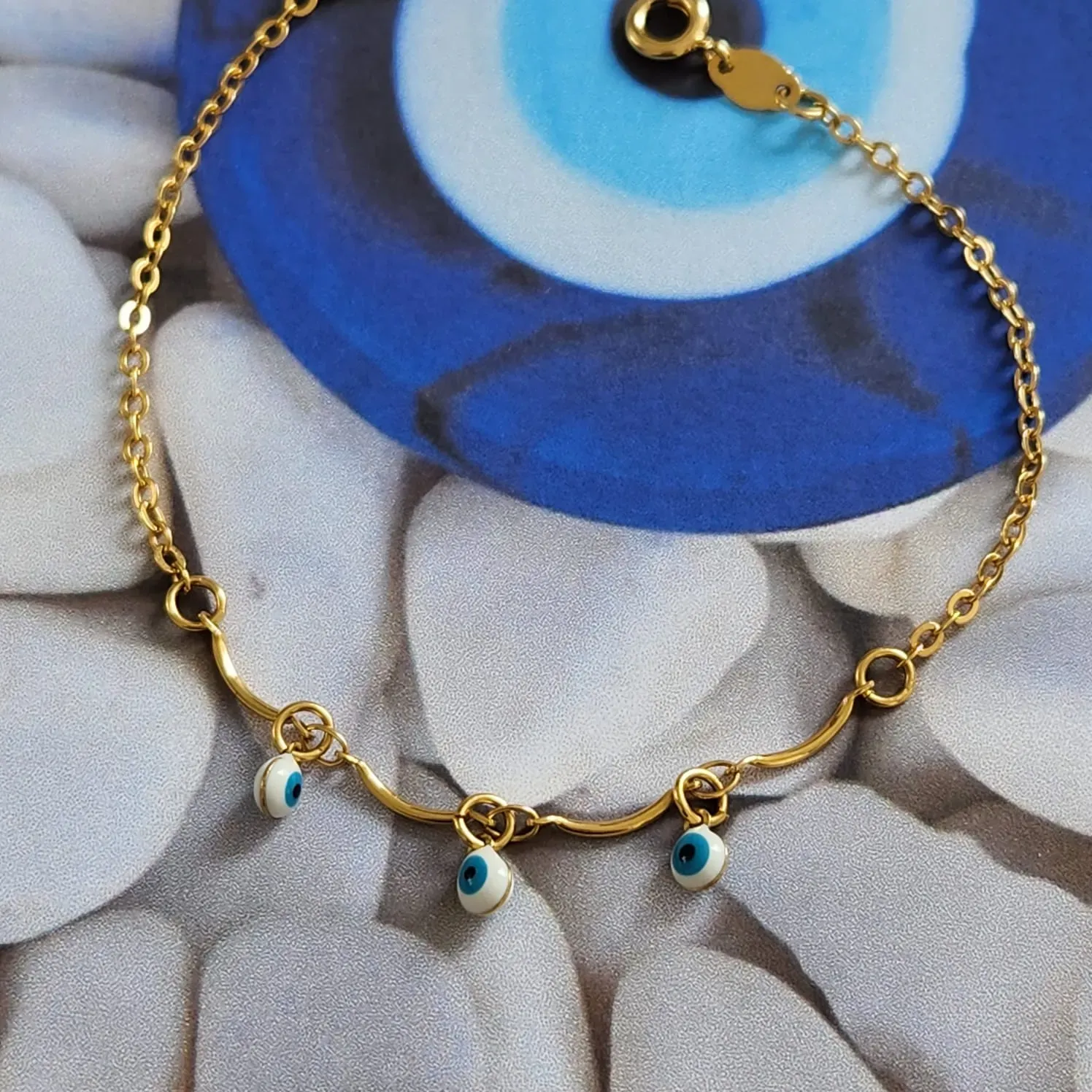 PULSEIRA DOURADA PINGENTE OLHO GREGO