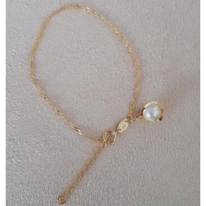 PULSEIRA SINGAPURA COM PINGENTE DOURADO PÉROLA