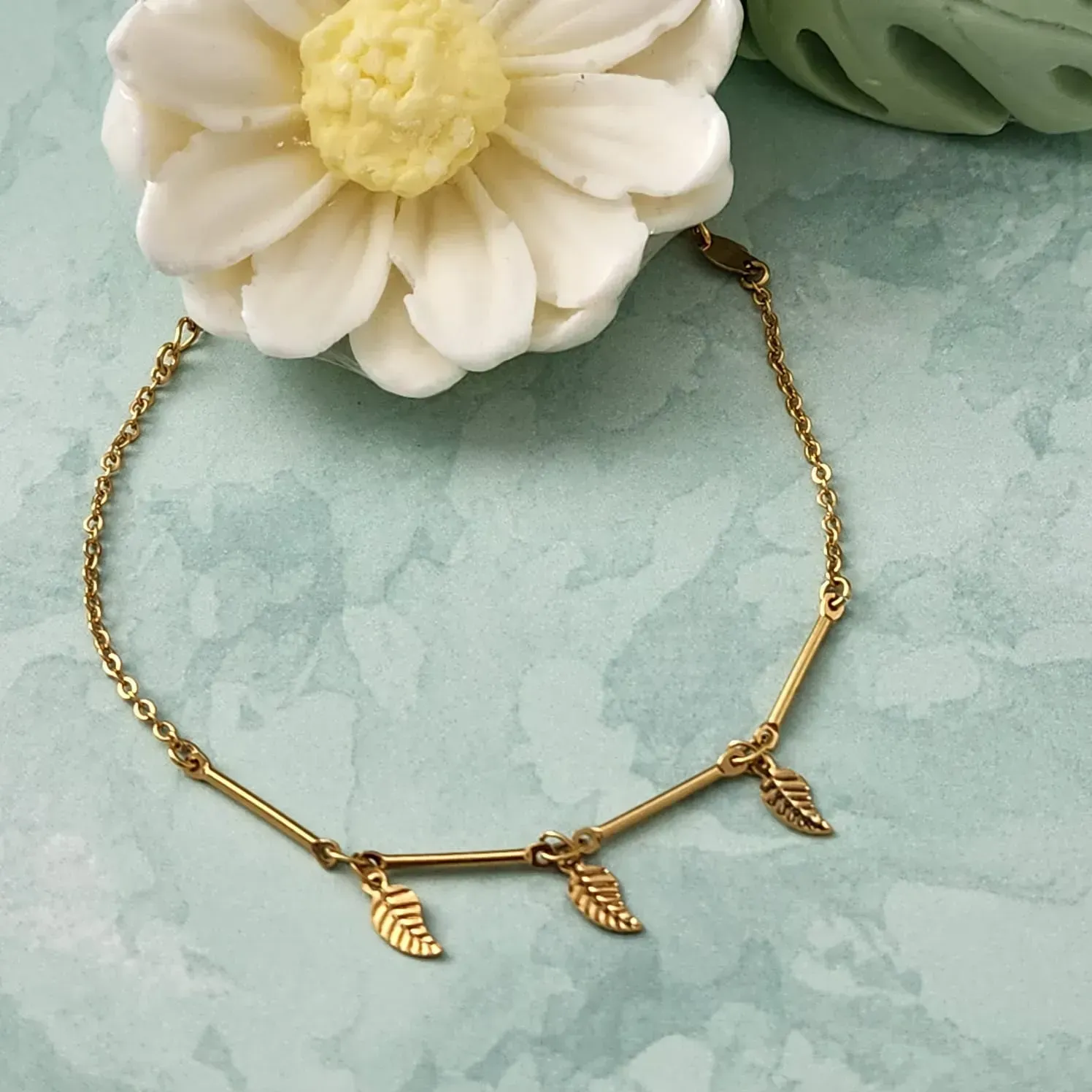 PULSEIRA DOURADA FOLHA