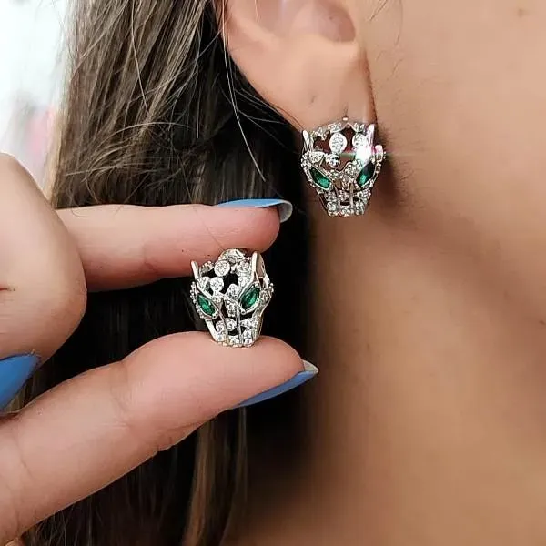 BRINCO TIGRE CRAVEJADO OLHO VERDES