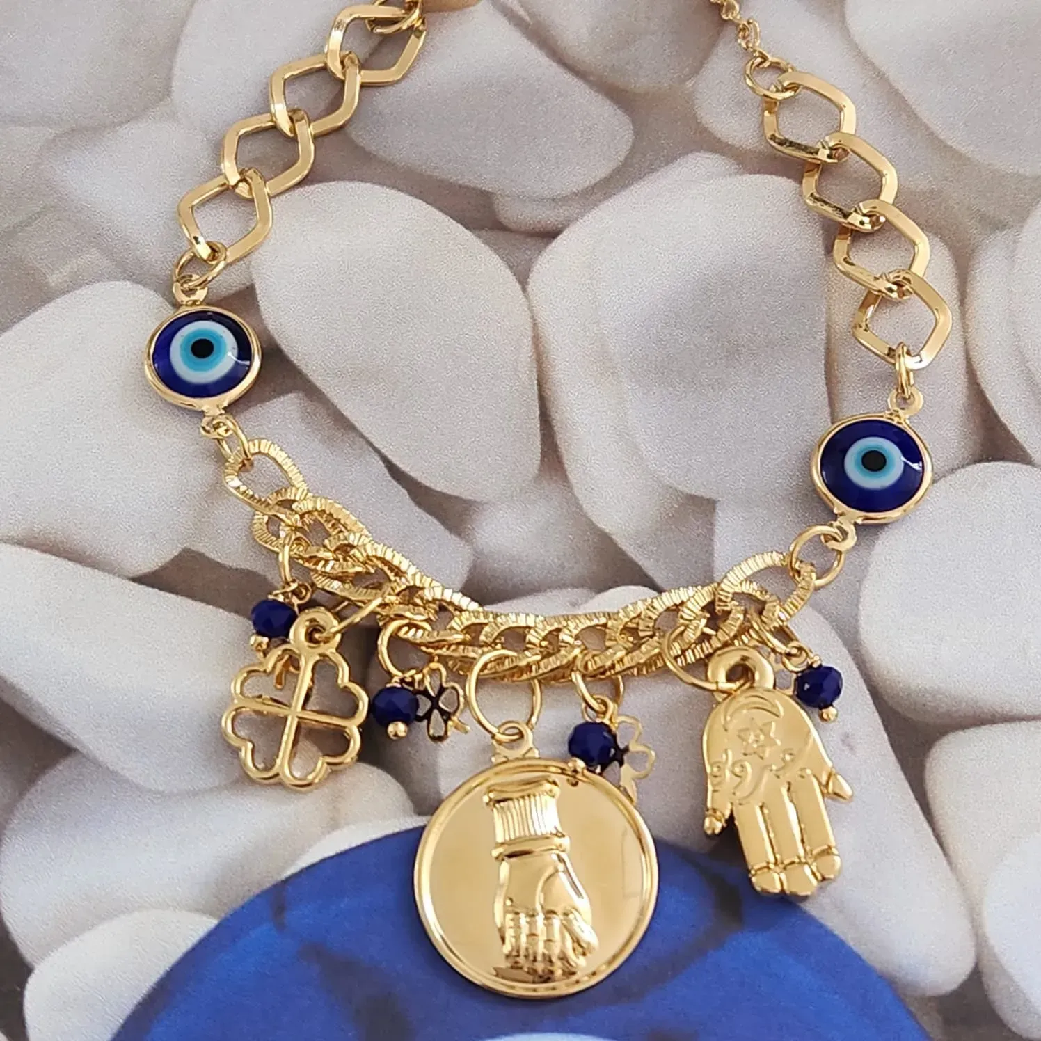 PULSEIRA DOURADA PATUÁ OLHO GREGO,TREVO DE QUATRO FOLHAS, MÃO DE FATIMA E FIGA