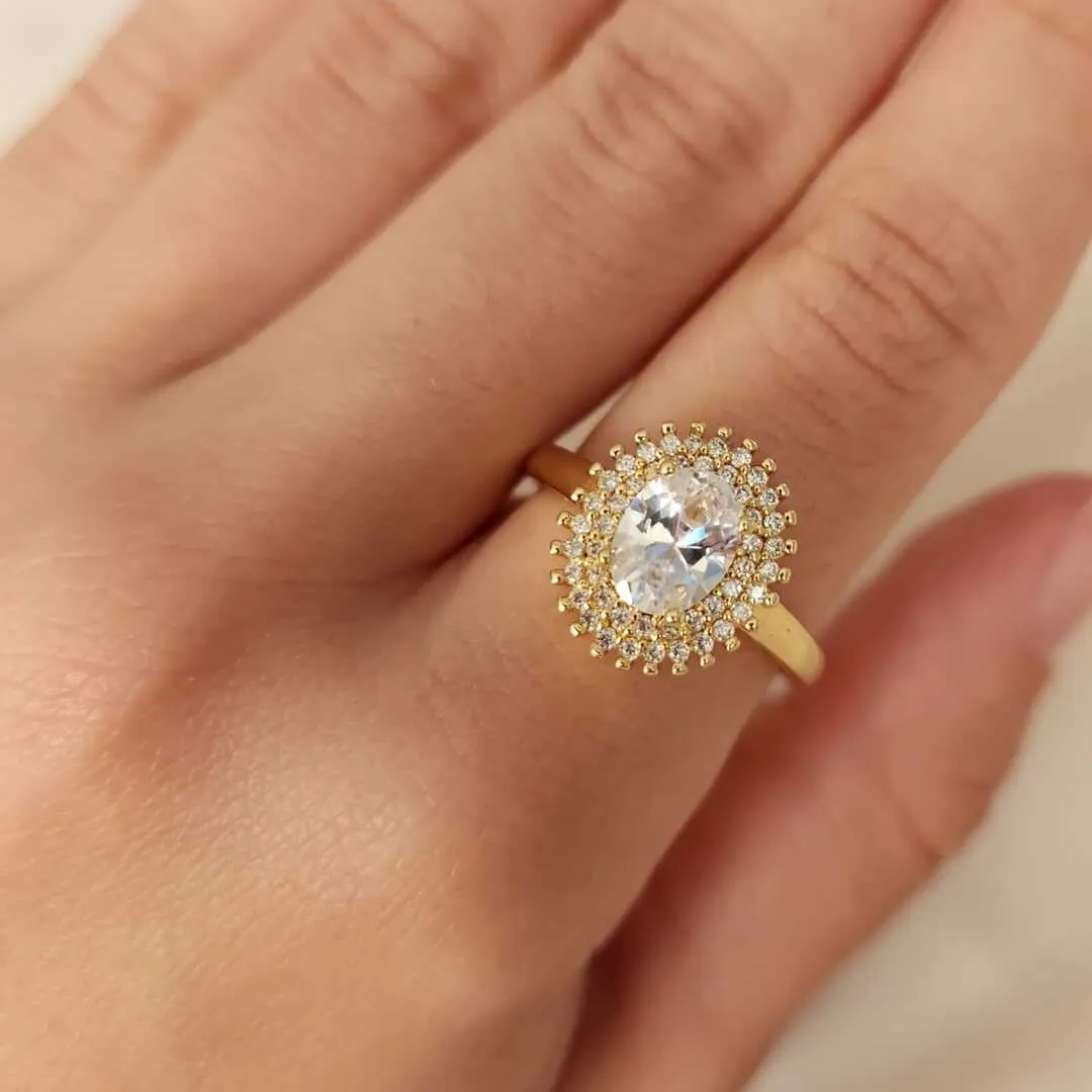 ANEL DOURADO PEDRA OVAL CRISTAL CRAVEJADO MICROZIRCÔNIAS